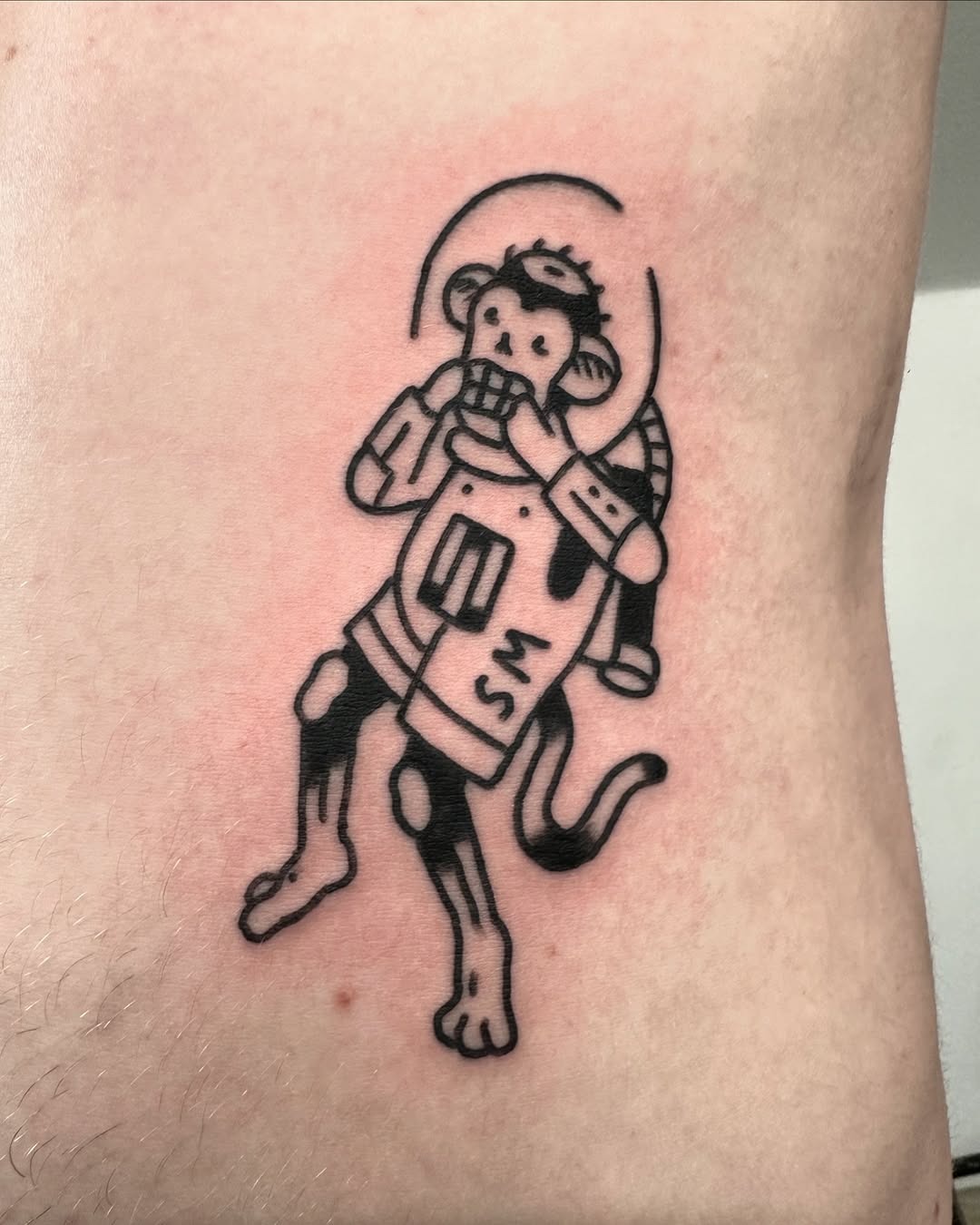 Playful astronaut monkey tattoo showcasing creativity Tattoo Design