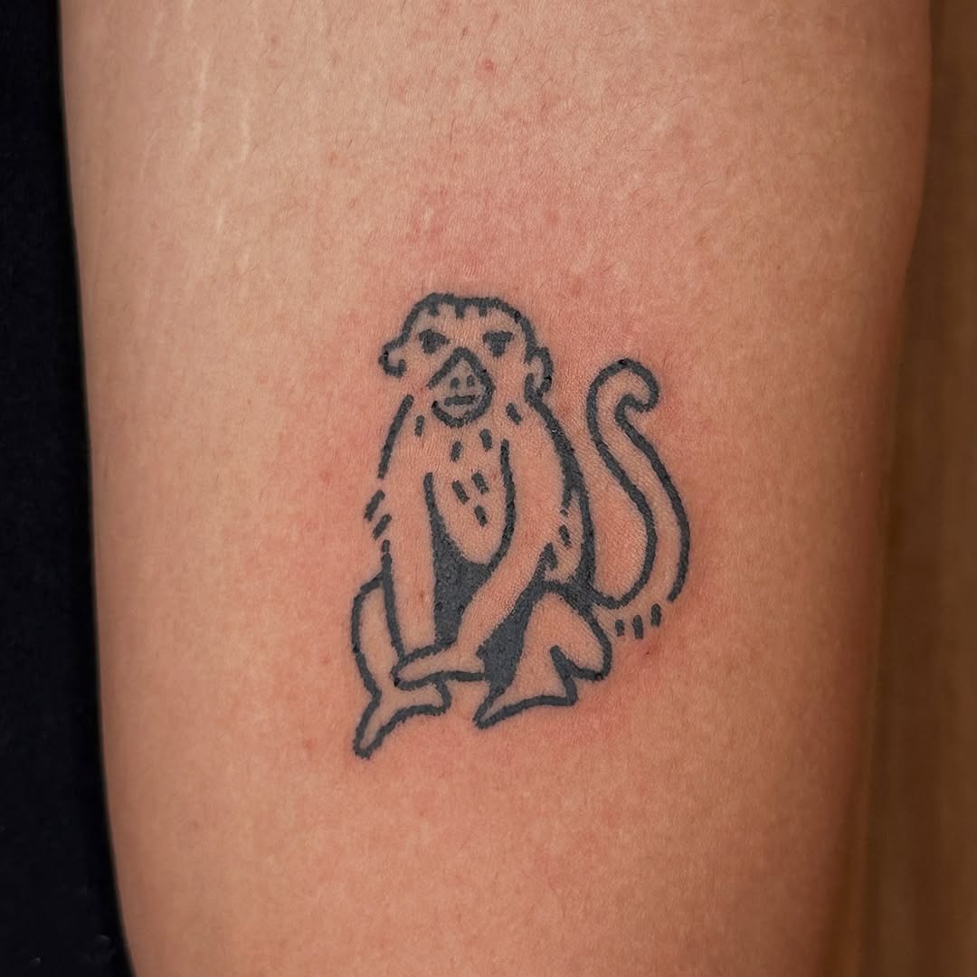 Stylish minimalist monkey tattoo in black ink Tattoo Design