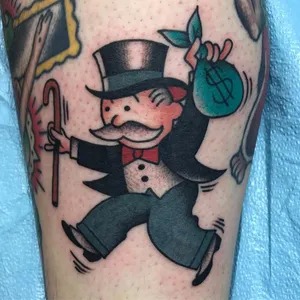 Cartoon-Inspired Monopoly Man Tattoo Design