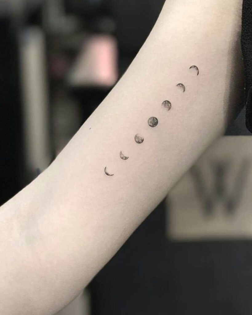 Vertical Inner Arm Moon Phases Tattoo Tattoo Design