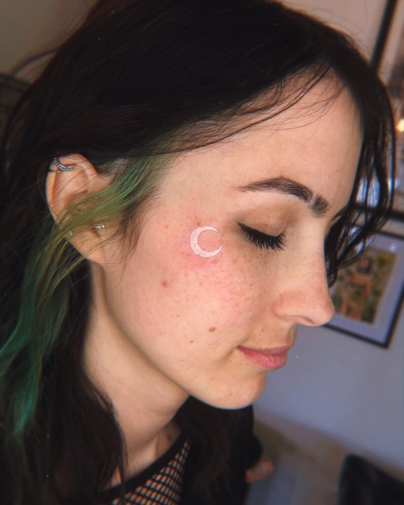 White Ink Crescent Moon Face Tattoo Tattoo Design