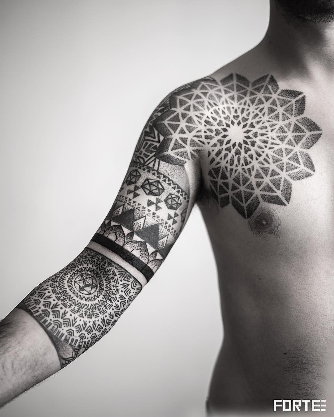 Powerful Chest, Arm and Shoulders Mosaic Tattoo Tattoo Design