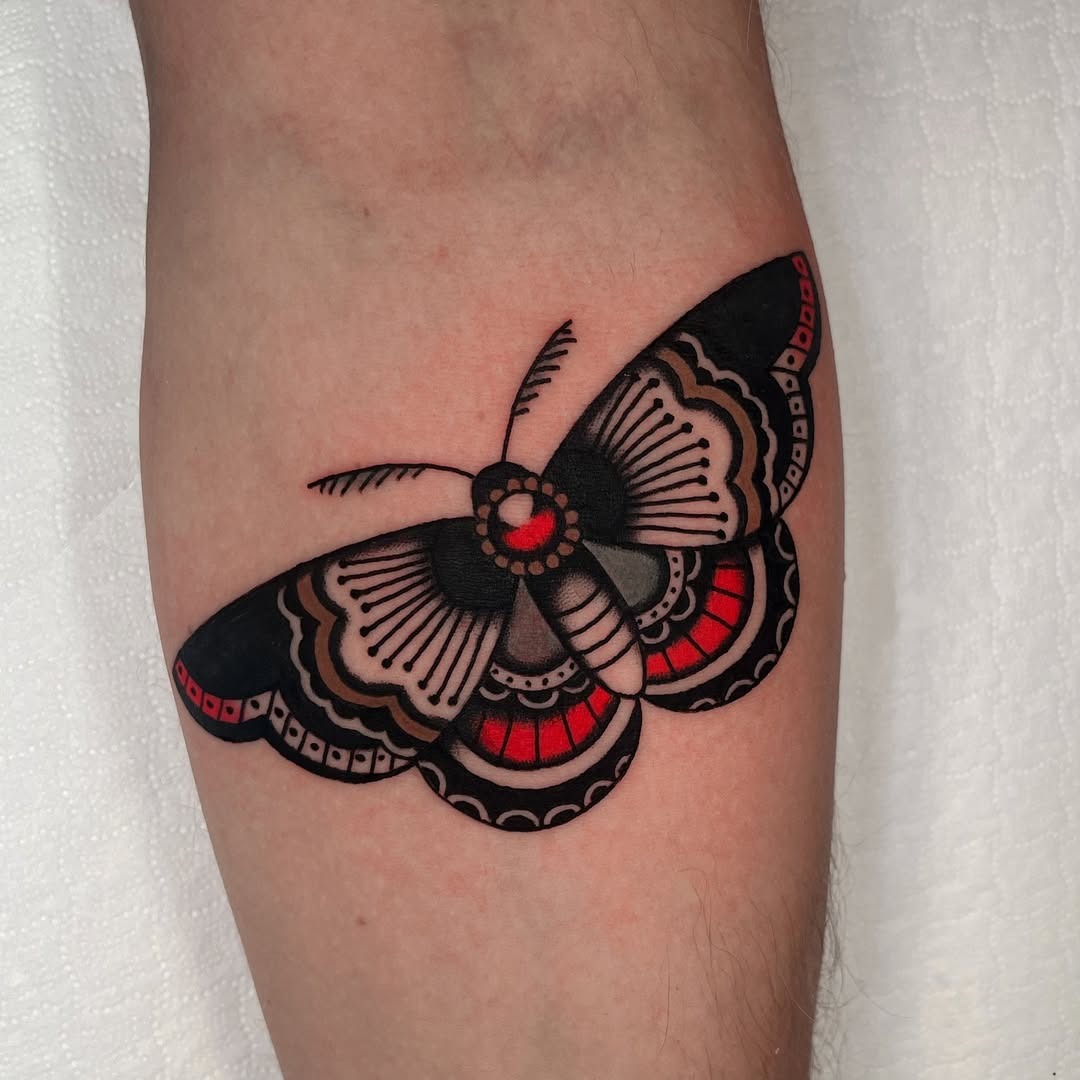 Bold black and red moth tattoo design Tattoo Design
