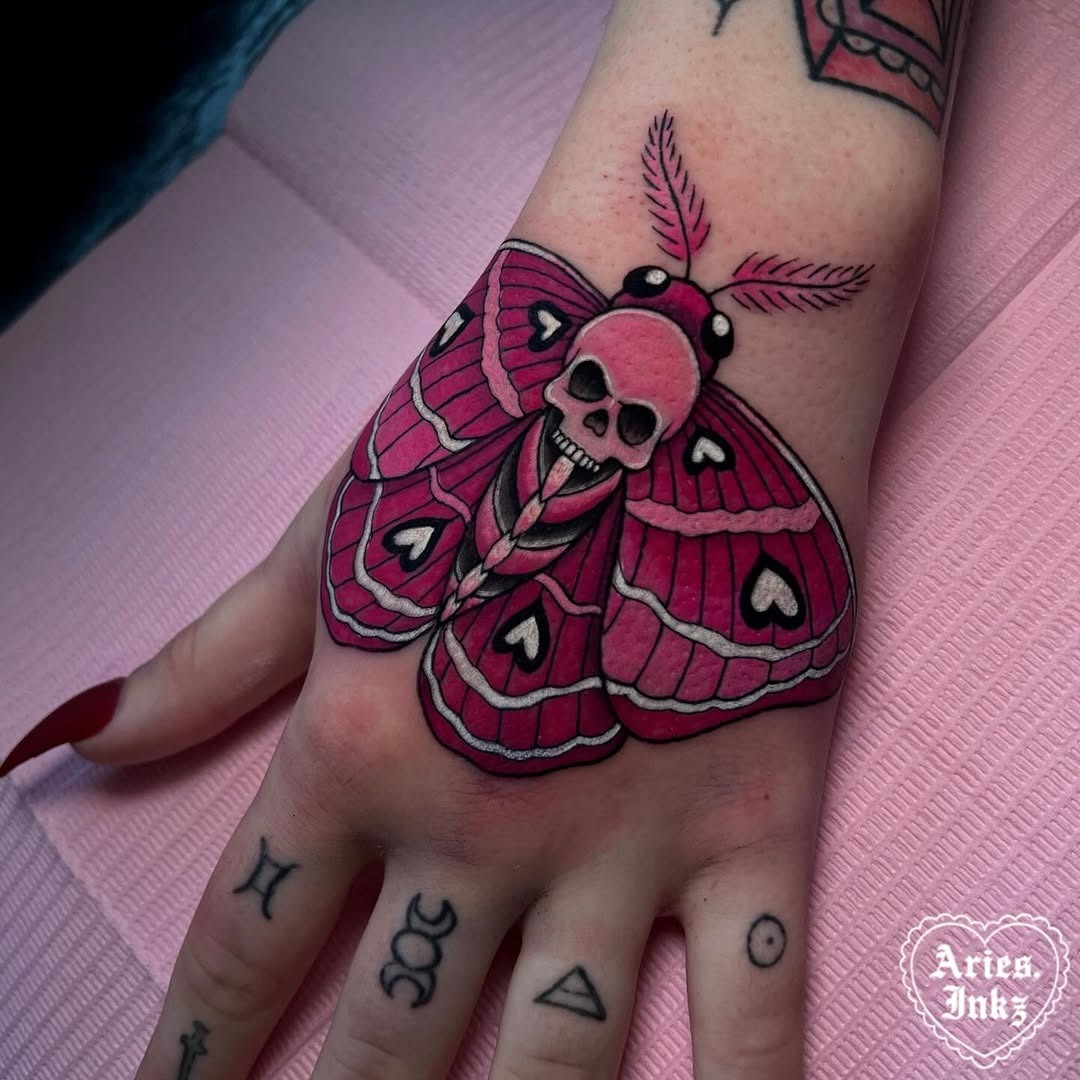 Bold moth tattoo with a skull twist Tattoo Design