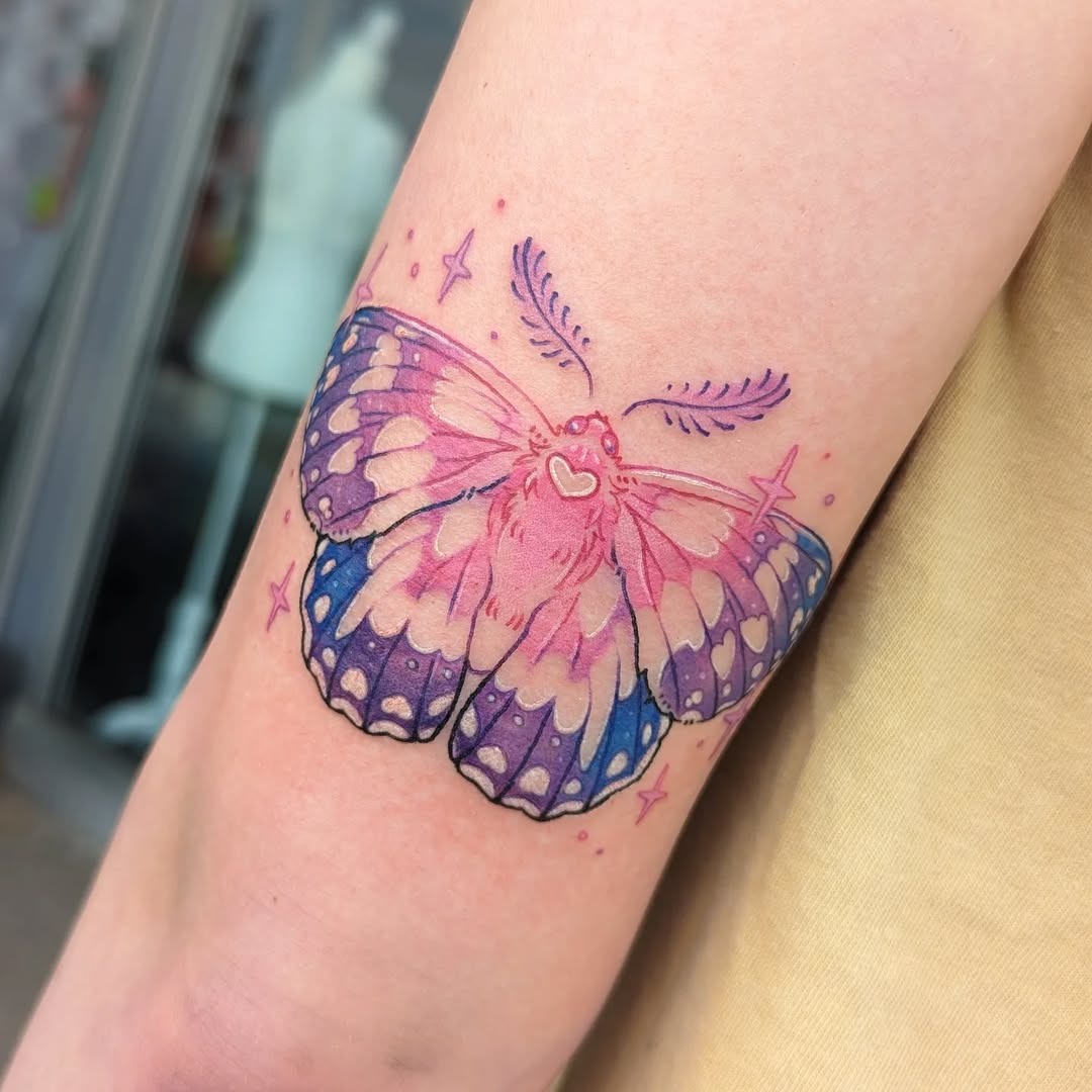 Colorful moth tattoo exuding whimsical charm Tattoo Design