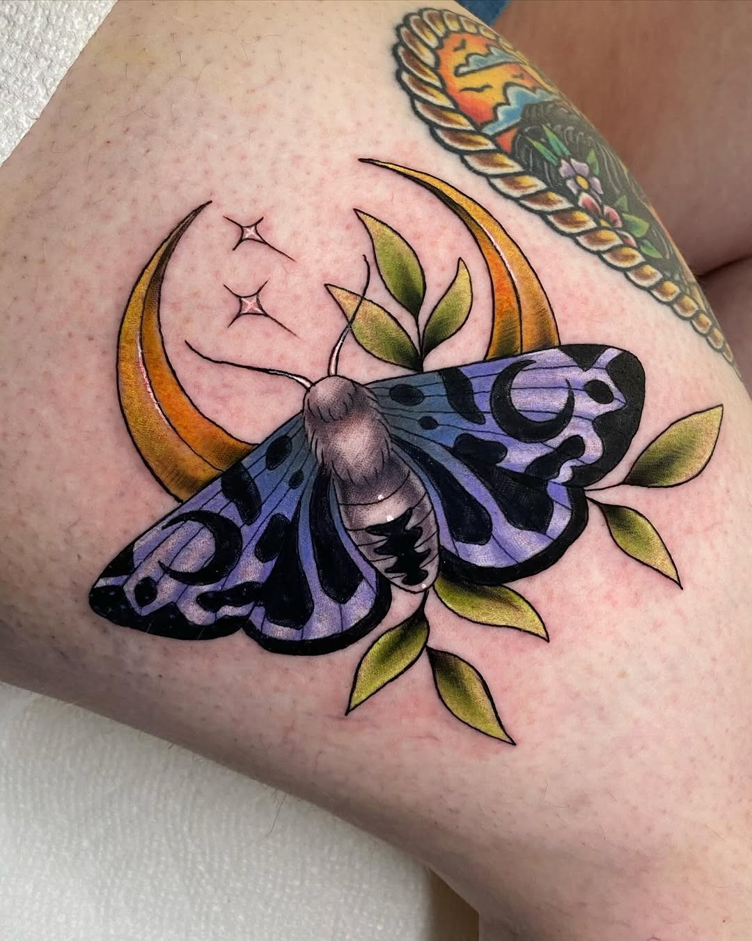 Elegant moth tattoo with celestial vibes Tattoo Design
