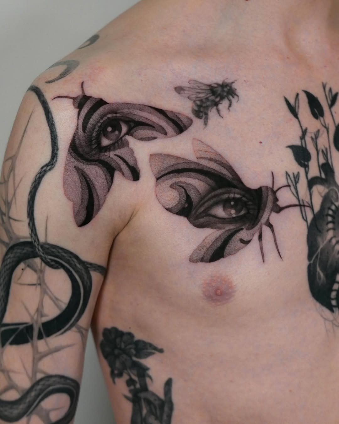 Intricate moth tattoo with intriguing eye details Tattoo Design
