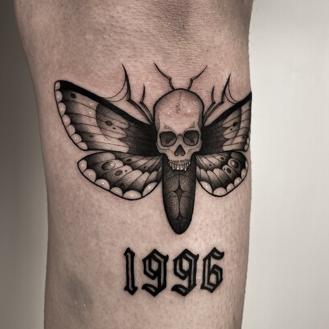 Unique moth tattoo with skull and year Tattoo Design