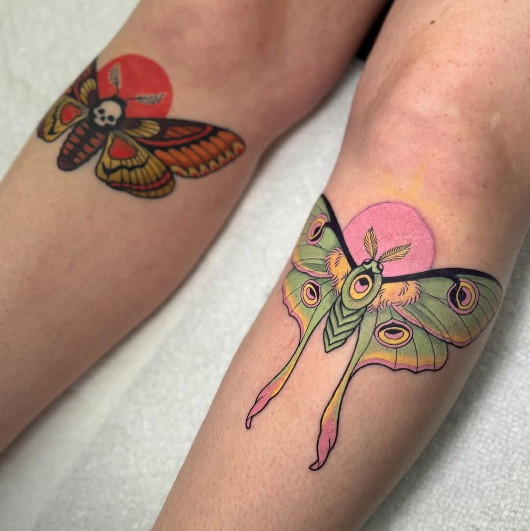 Vibrant moth tattoos with playful skull motifs Tattoo Design