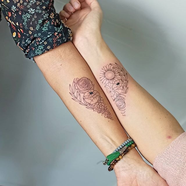 Mother Daughter Heart Tattoo with Foliage and Flowers Tattoo Design