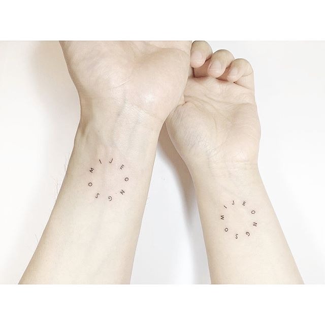 Wheel of Letters Wrist Tattoo Tattoo Design