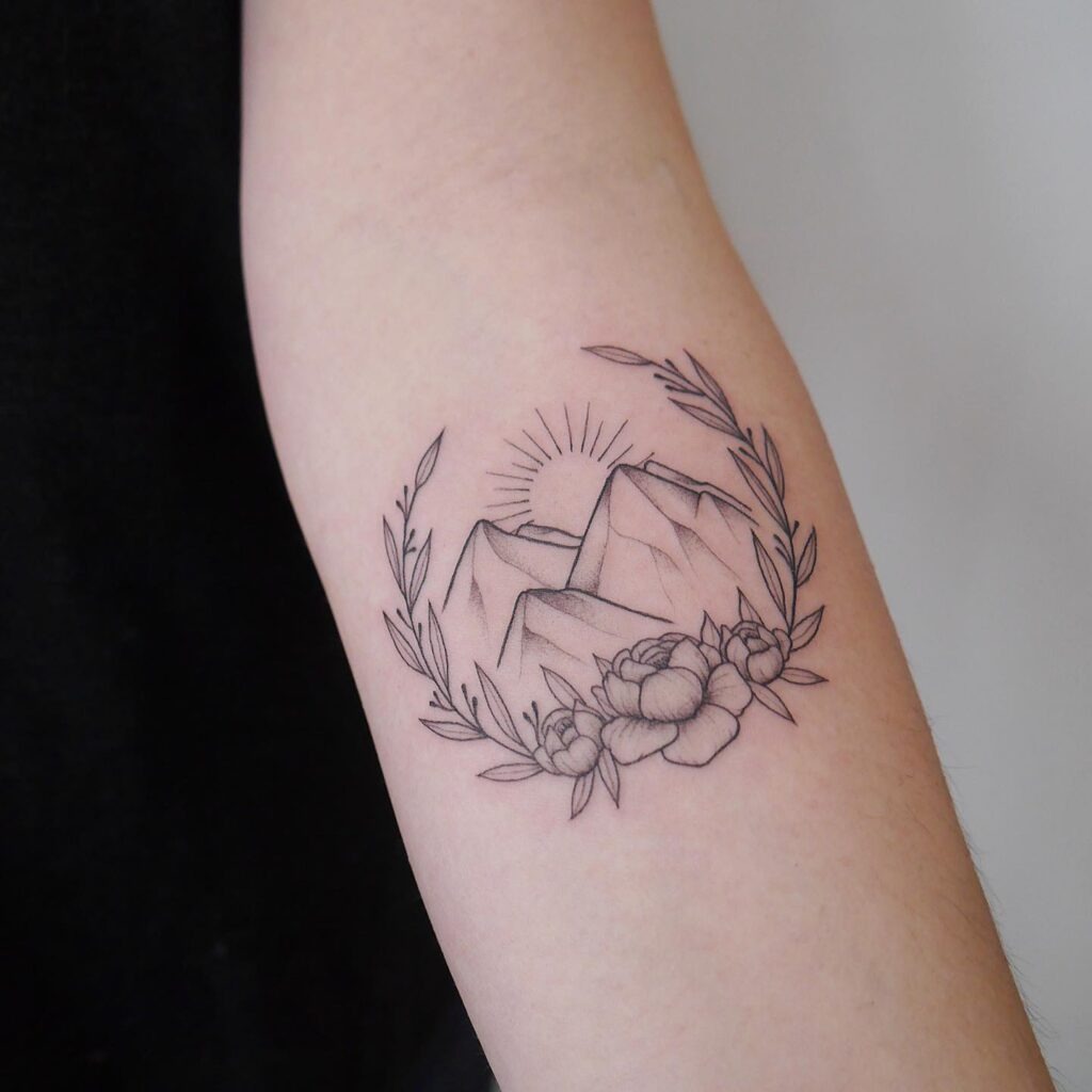 Mountain and Floral Wreath Tattoo Tattoo Design