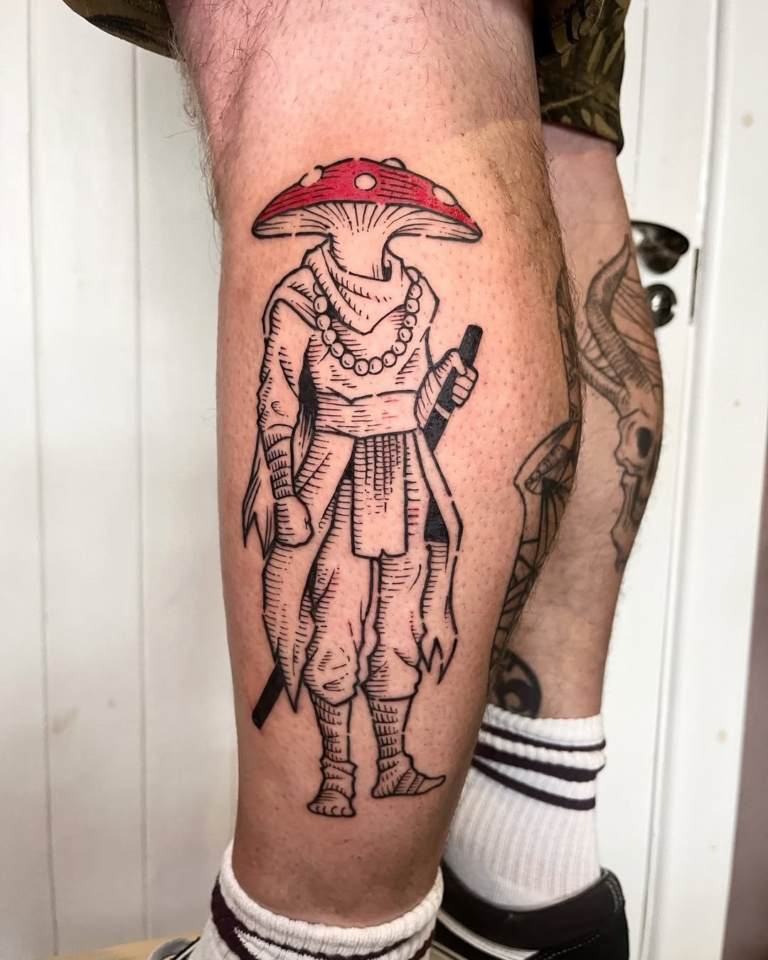 Mystical mushroom-inspired figure tattoo design Tattoo Design