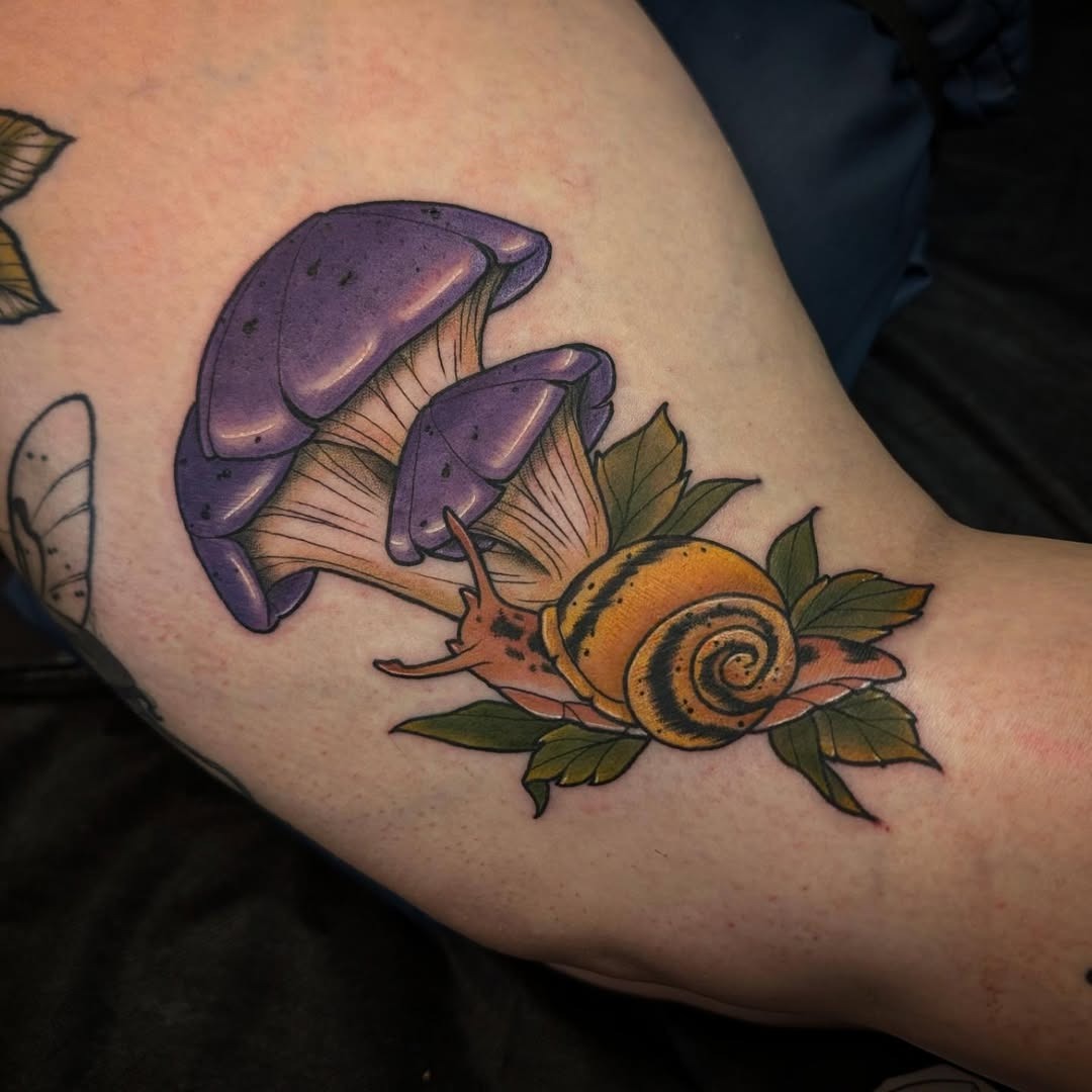 Vibrant purple mushroom and snail tattoo design Tattoo Design