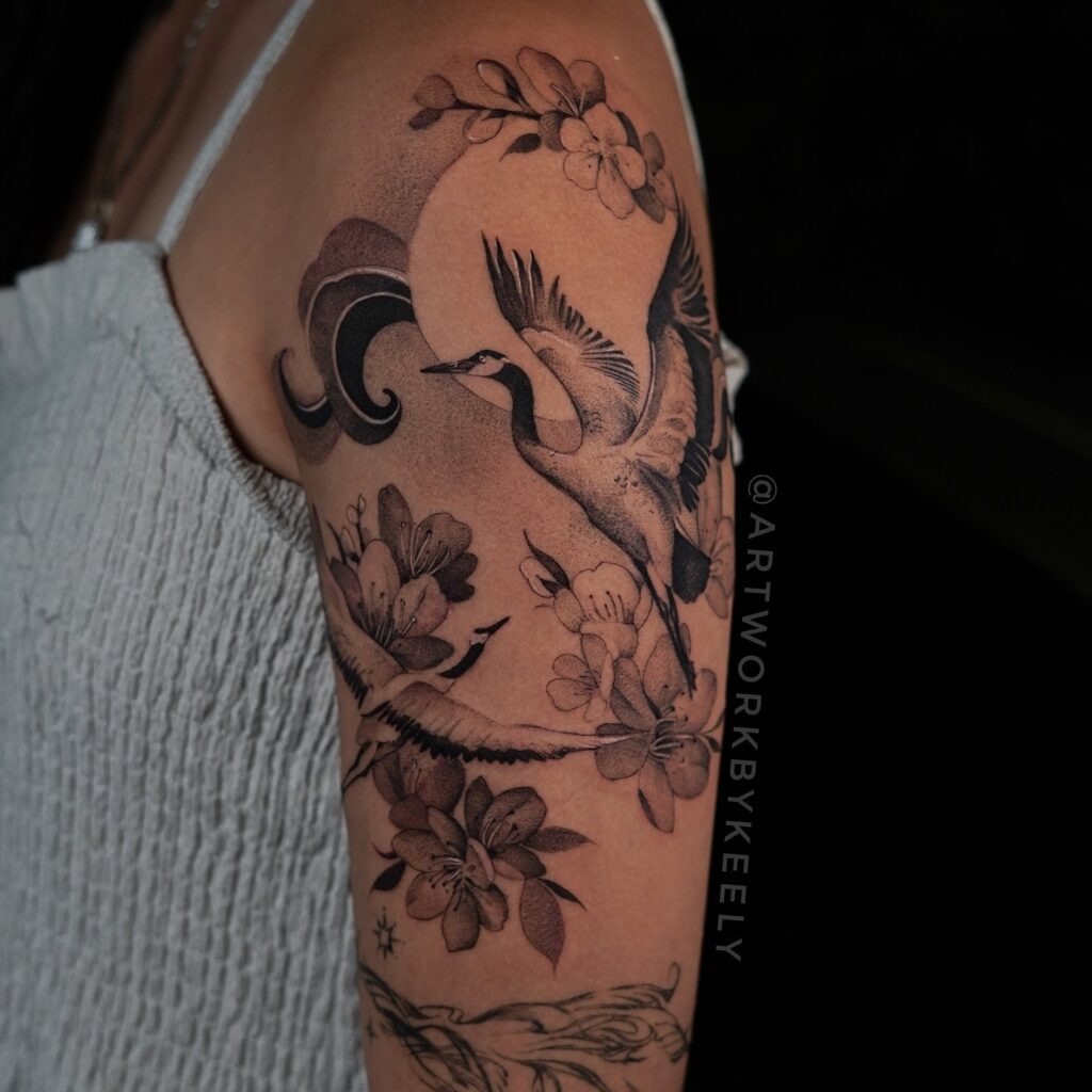Cranes with Blossoms and Mystical Sun Tattoo Tattoo Design