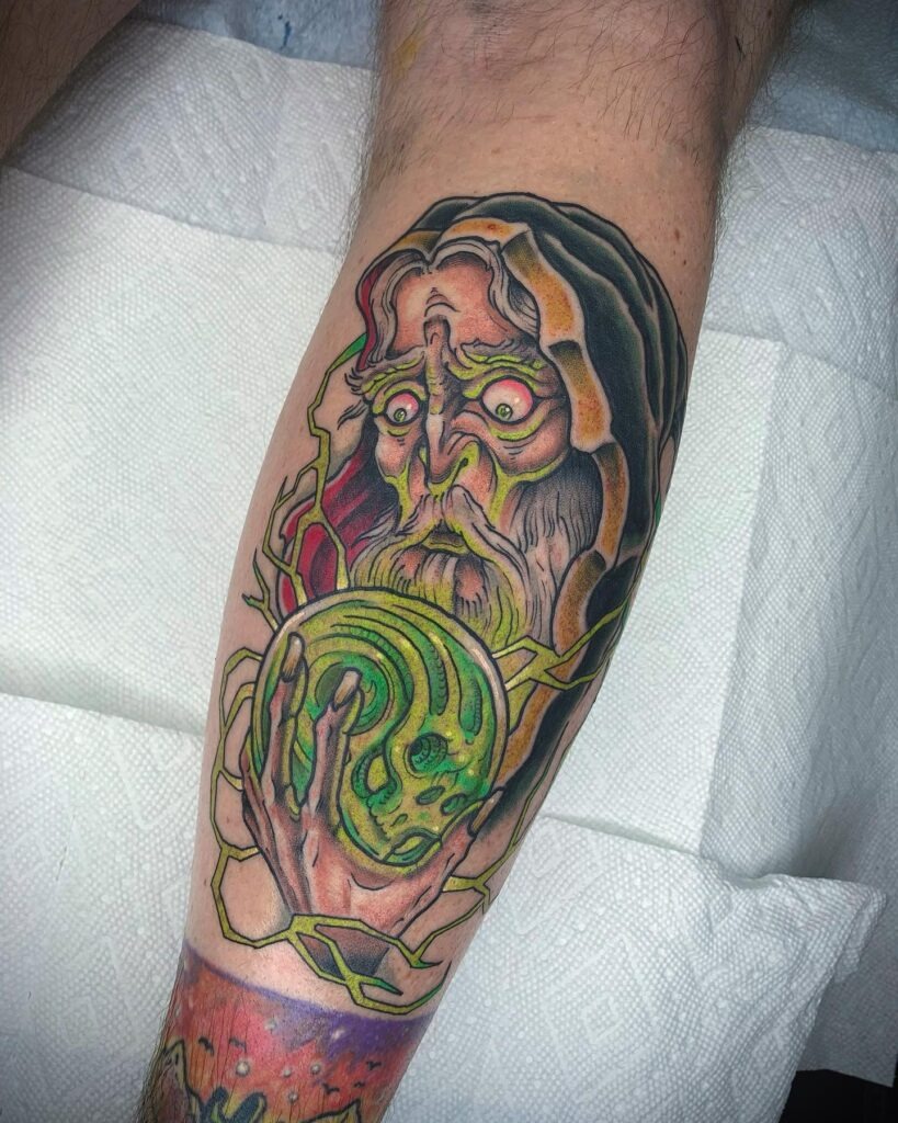Mystic Wizard with Orb Tattoo Tattoo Design