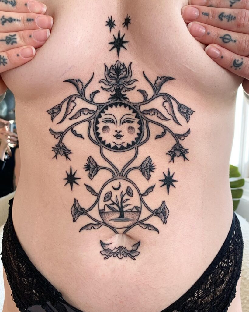Mystical Sun and Moon Stomach Tattoo with Floral and Tree Motifs Tattoo Design