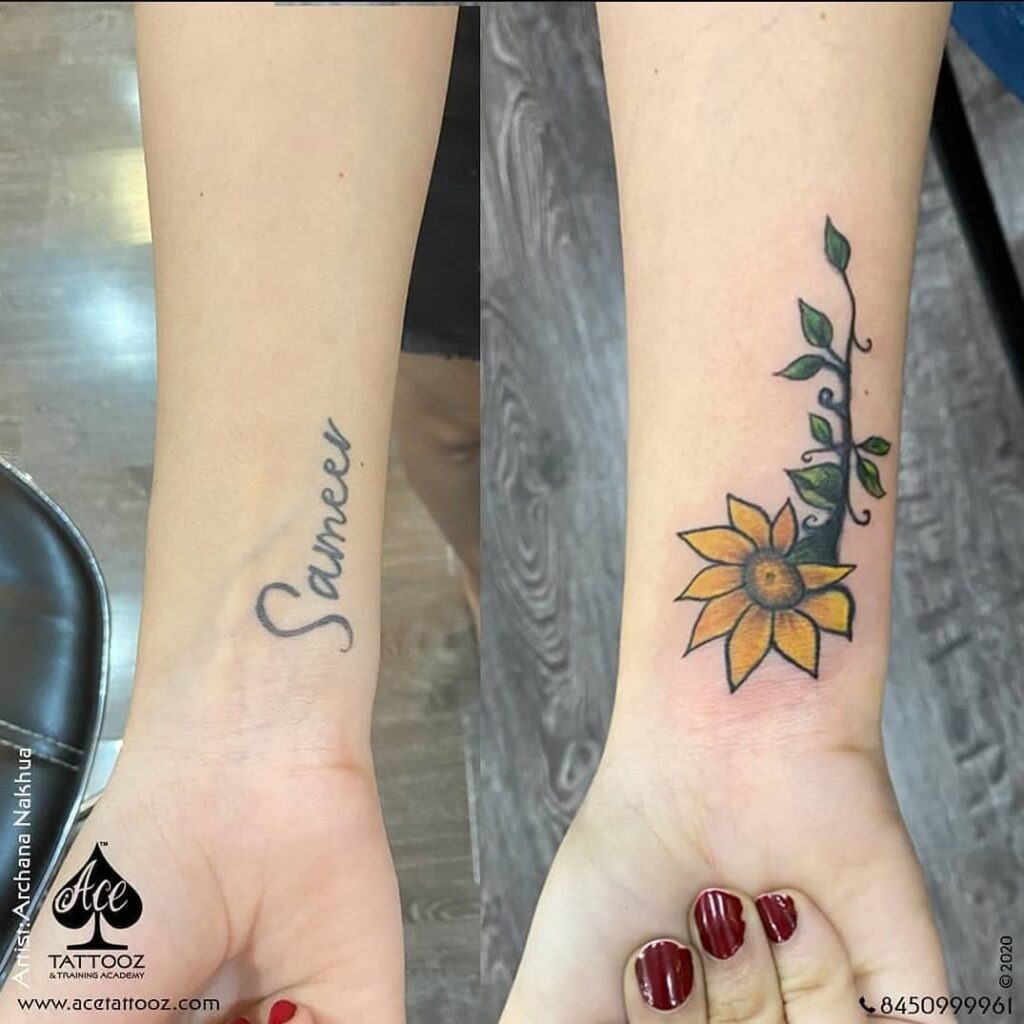 Sunflower and Vine Wrist Tattoo Covering Name Tattoo Design