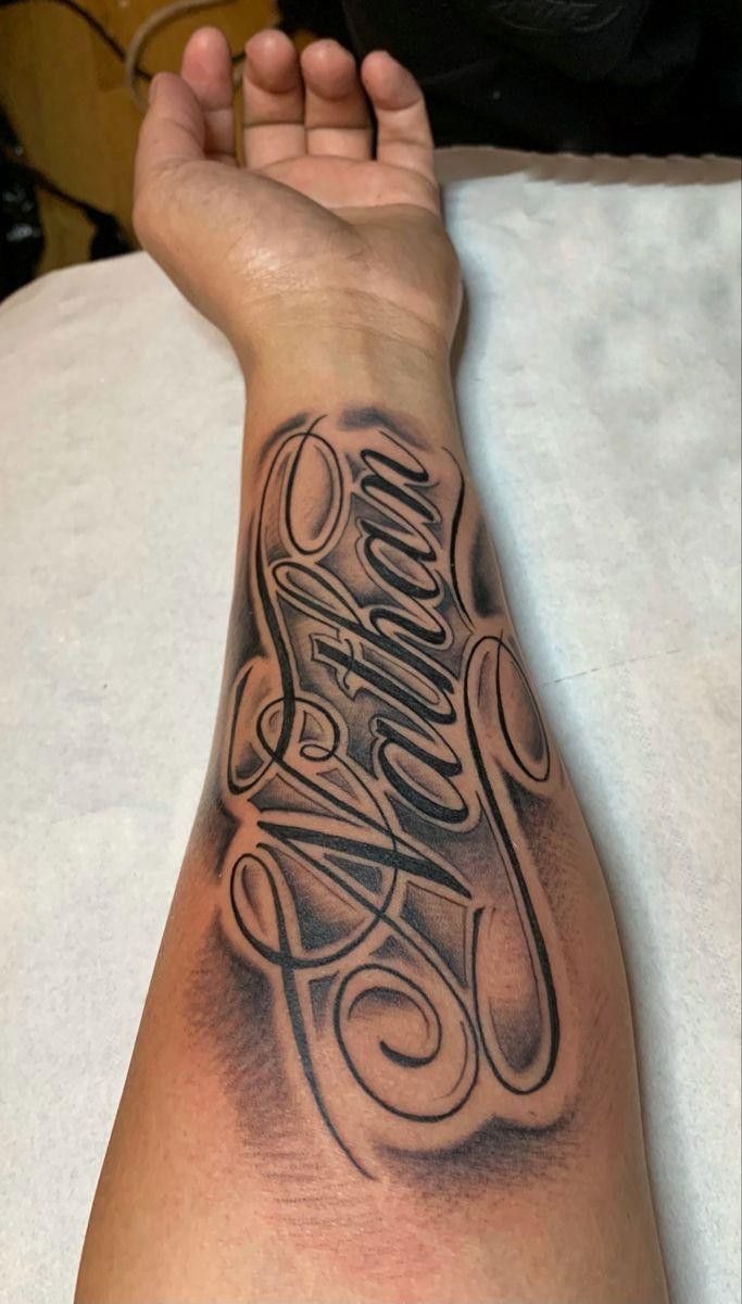 Bold Oversized Calligraphy Name Tattoo Tattoo Design