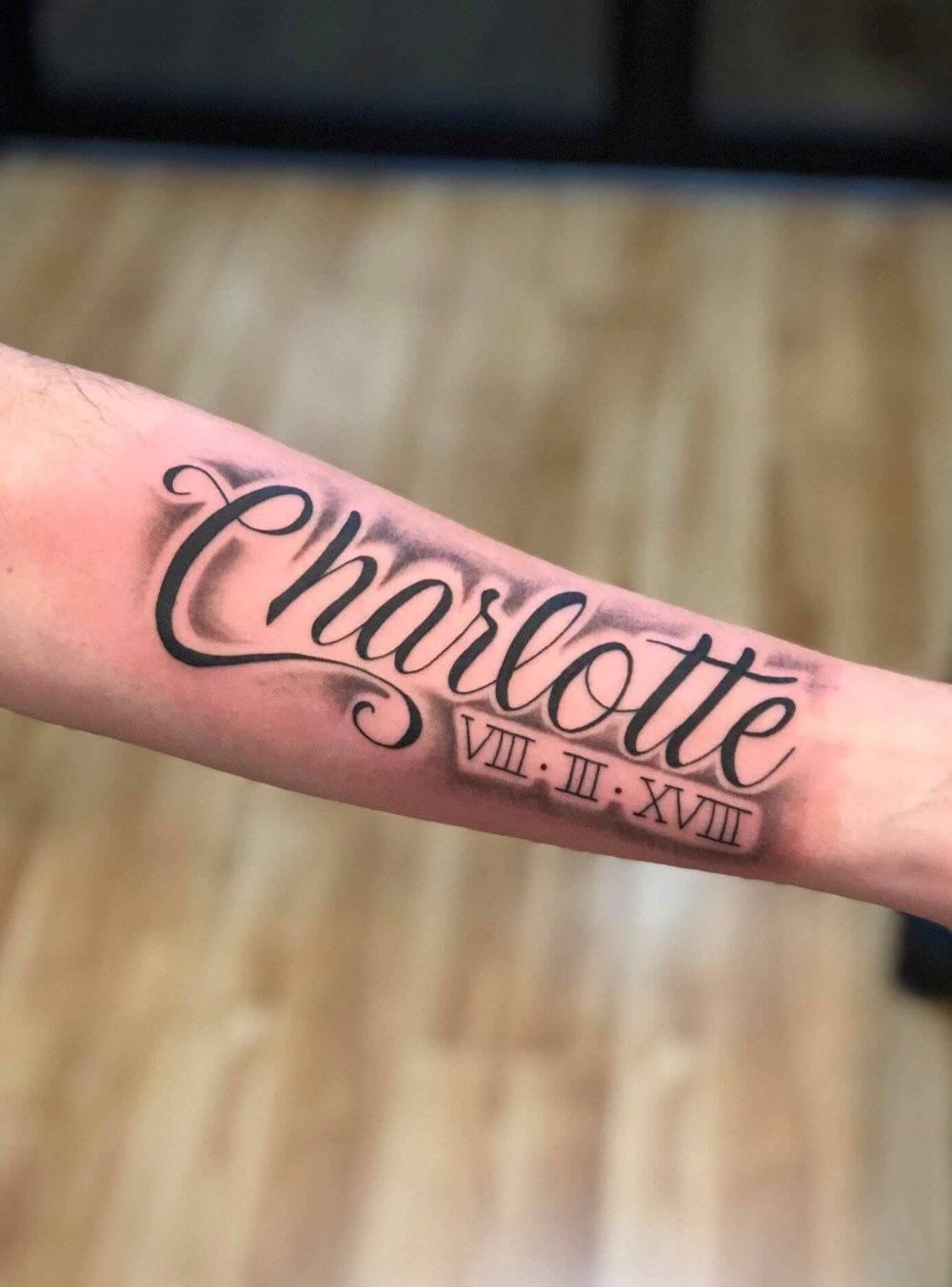 Charlotte Script Tattoo With Roman Numeral Date Tattoo Design