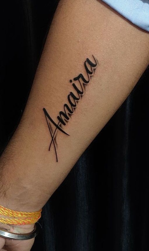 Elegant Single-Name Cursive Tattoo Tattoo Design