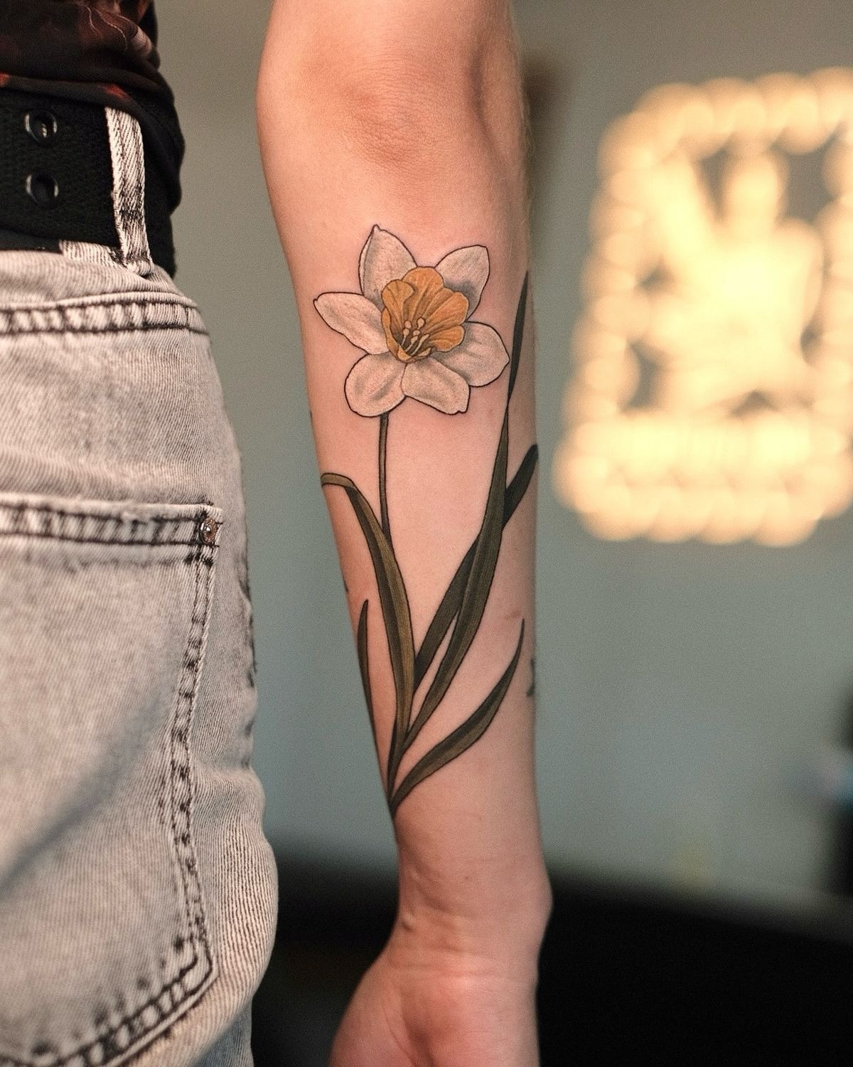 Geometric Narcissus With Red Accent Tattoo Design