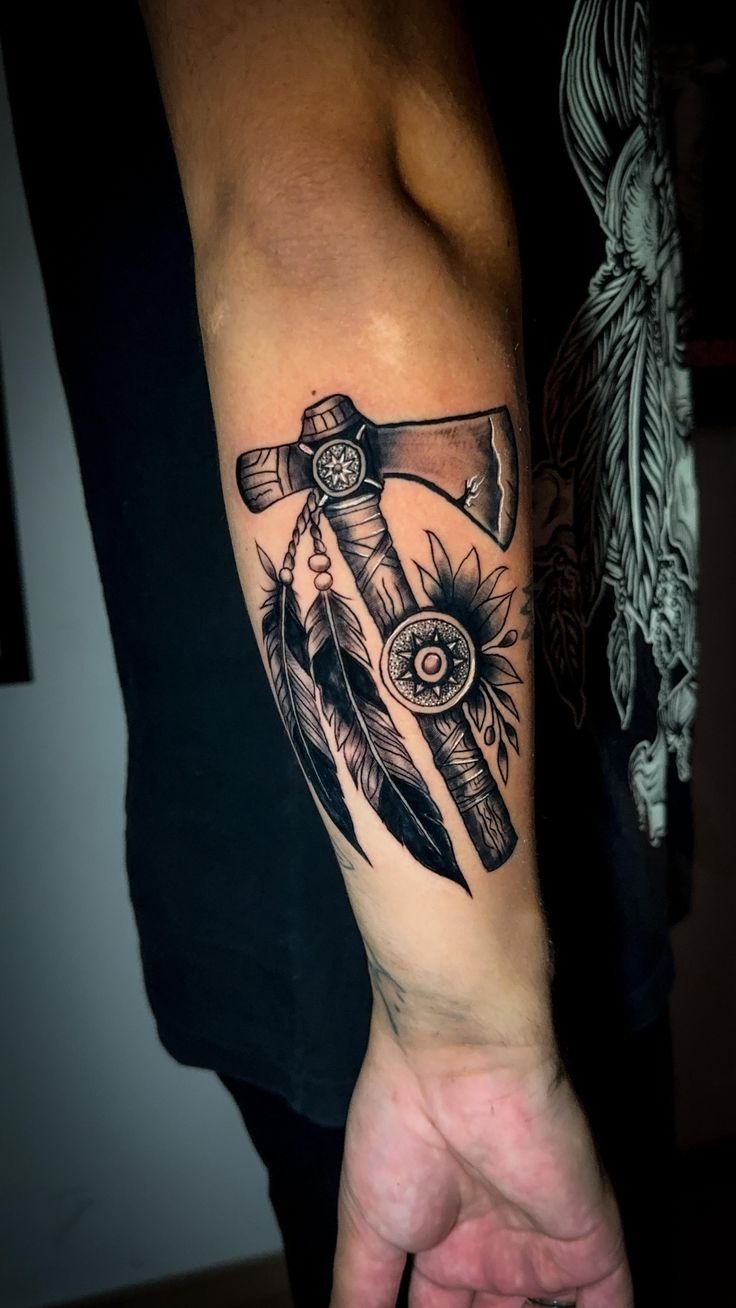 Feathered Tomahawk Symbol Piece Tattoo Design