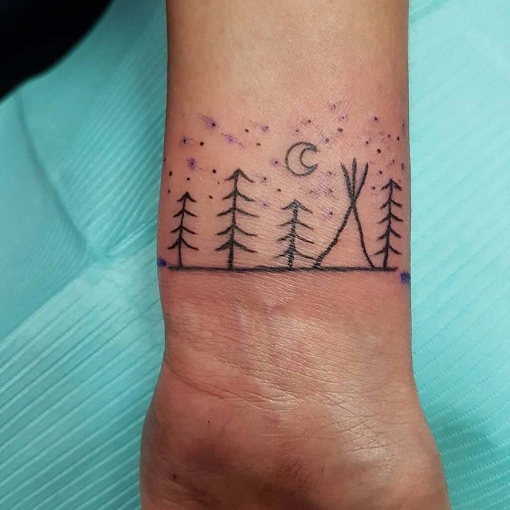 Minimalist Forest and Teepee Wrist Tattoo Tattoo Design