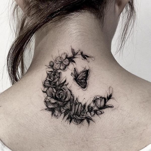 A Butterfly in a Circle of Flowers Tattoo Design
