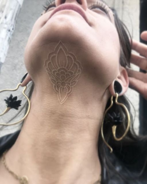 Invisible Ink: A Carefully Placed Tattoo Tattoo Design