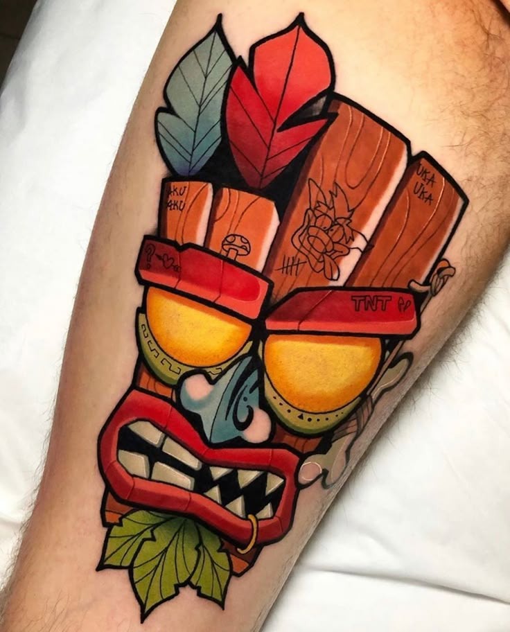 Aku Aku Mask: A Nostalgic and Playful Statement Tattoo Design