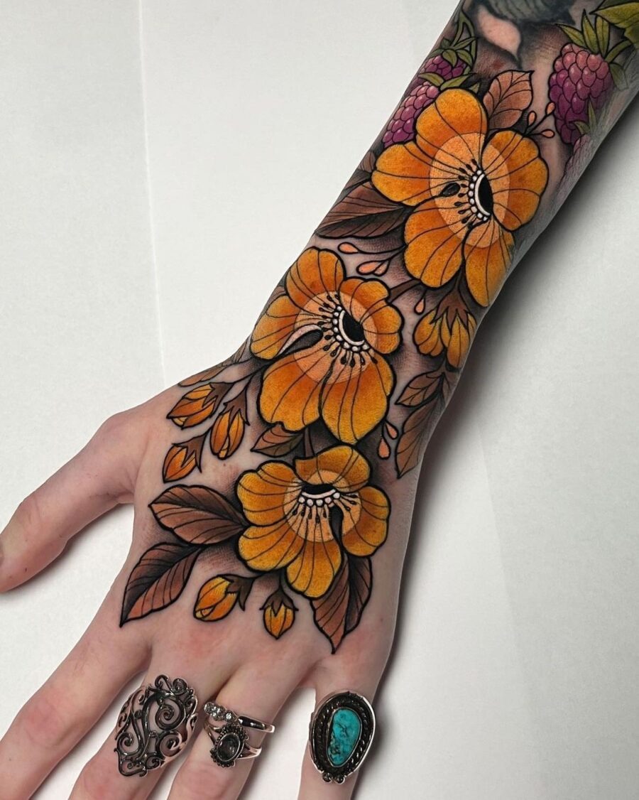 Bold and colorful floral hand tattoo design Tattoo Design