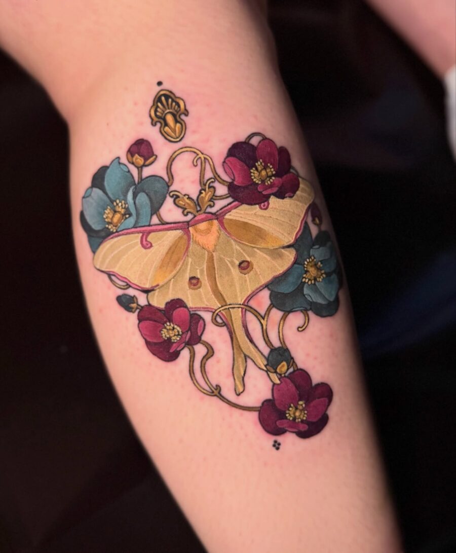 Elegant butterfly surrounded by vibrant flowers Tattoo Design