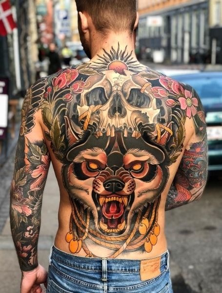 Full Back Masterpiece: Wolf and Skull Fusion Tattoo Design