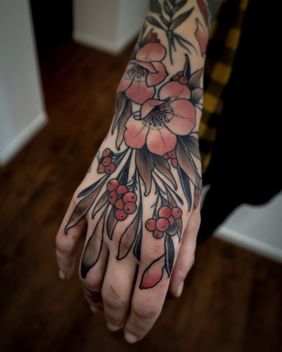 Vibrant floral neo traditional hand tattoo Tattoo Design