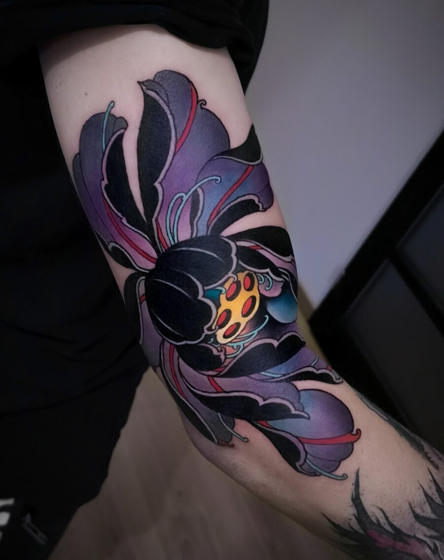 Vibrant neo-traditional flower tattoo with bold colors Tattoo Design