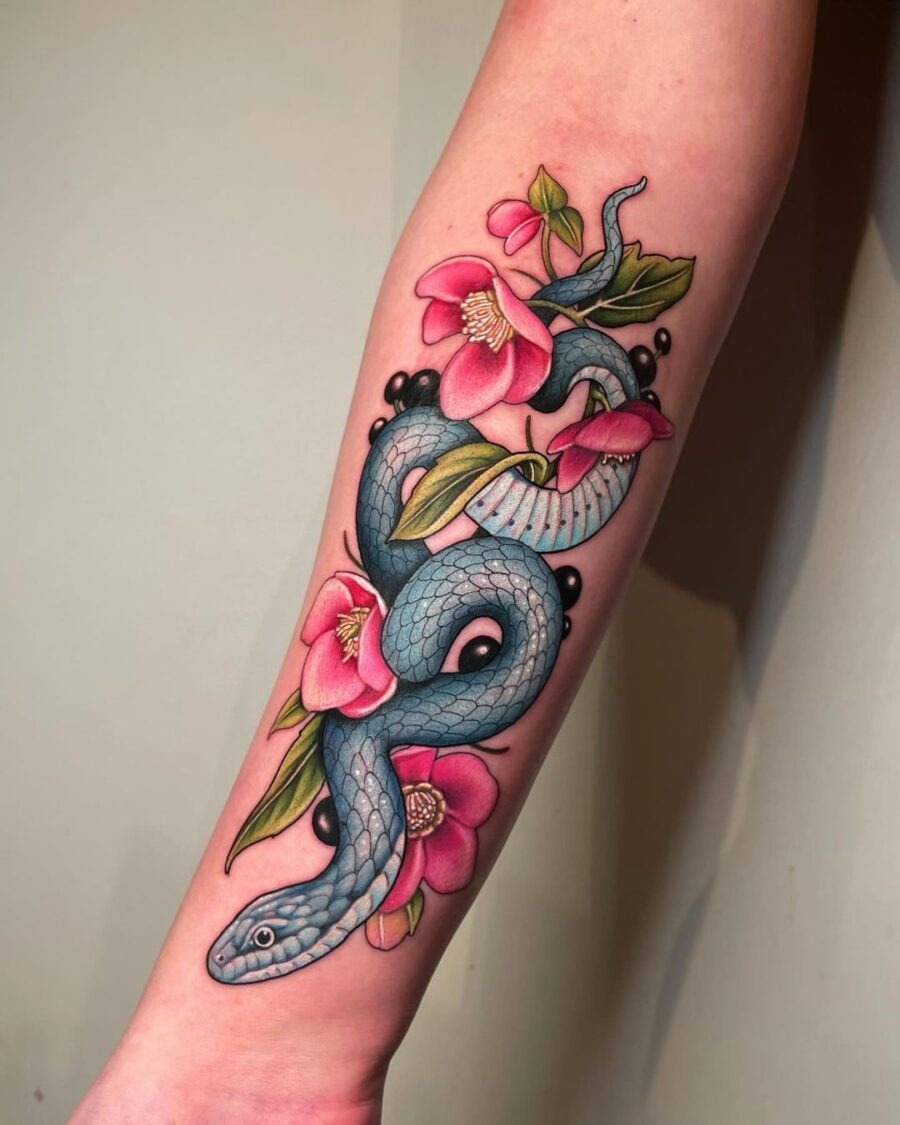 Vibrant snake entwined with blooming flowers Tattoo Design