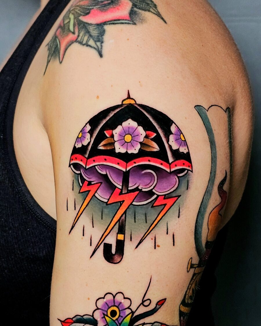 Vibrant Umbrella Tattoo with Floral Elements Tattoo Design