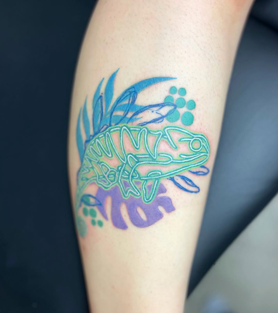 Colorful neon frog tattoo design on skin Tattoo Design