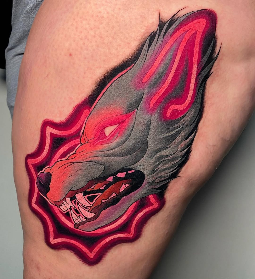 Striking neon wolf tattoo with vibrant colors Tattoo Design