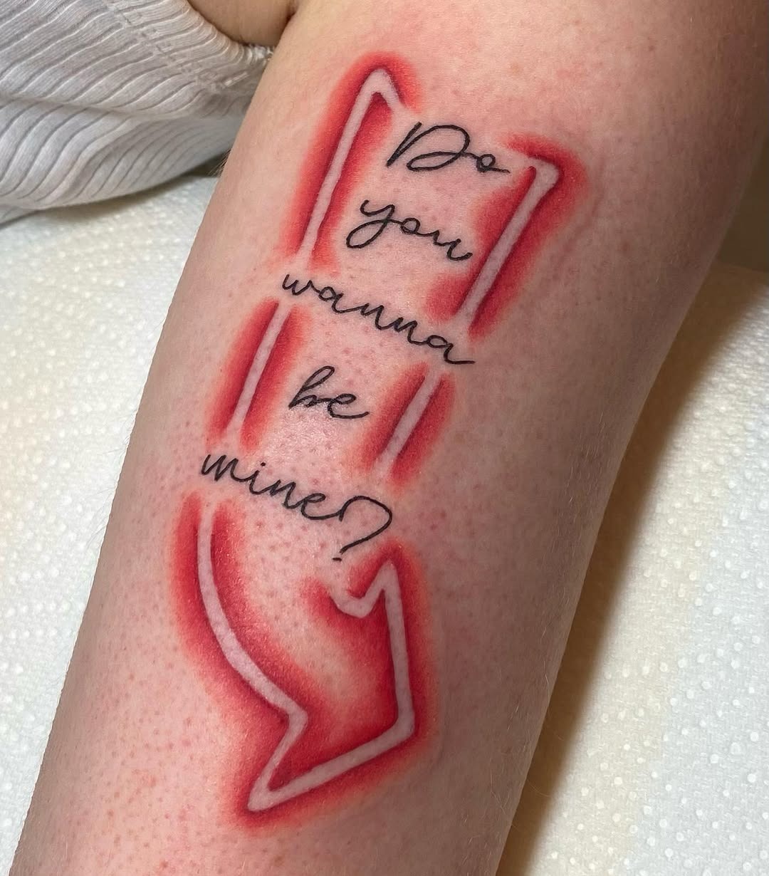Text tattoo with a vibrant neon arrow design Tattoo Design