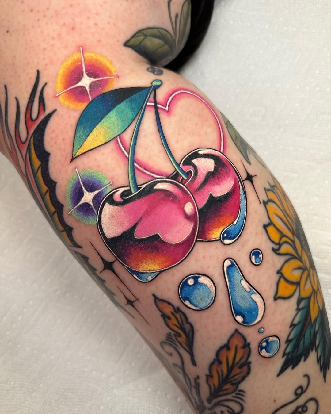 Vibrant neon cherry tattoo with playful vibes Tattoo Design