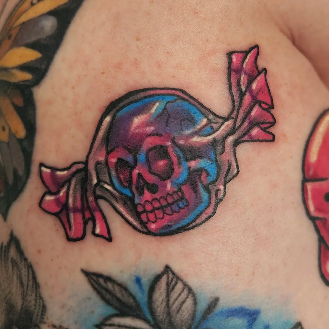 Vibrant neon skull with candy accents Tattoo Design