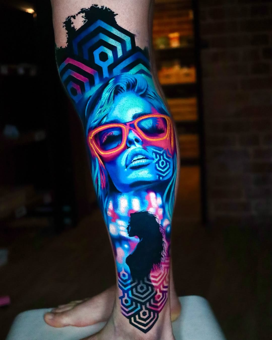 Vibrant Neon Tattoo with Geometric Patterns Tattoo Design