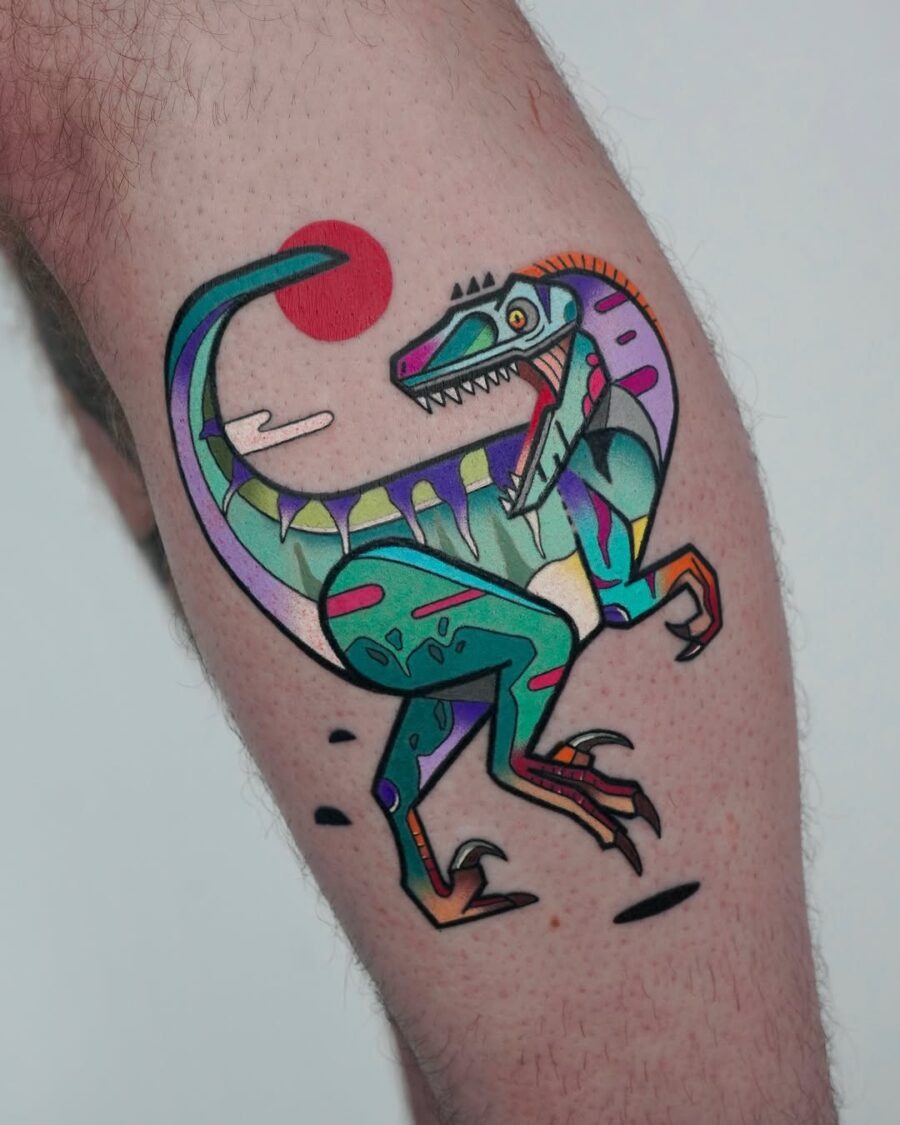 This striking tattoo features a playful, colorful dinosaur design that pops against the skin.