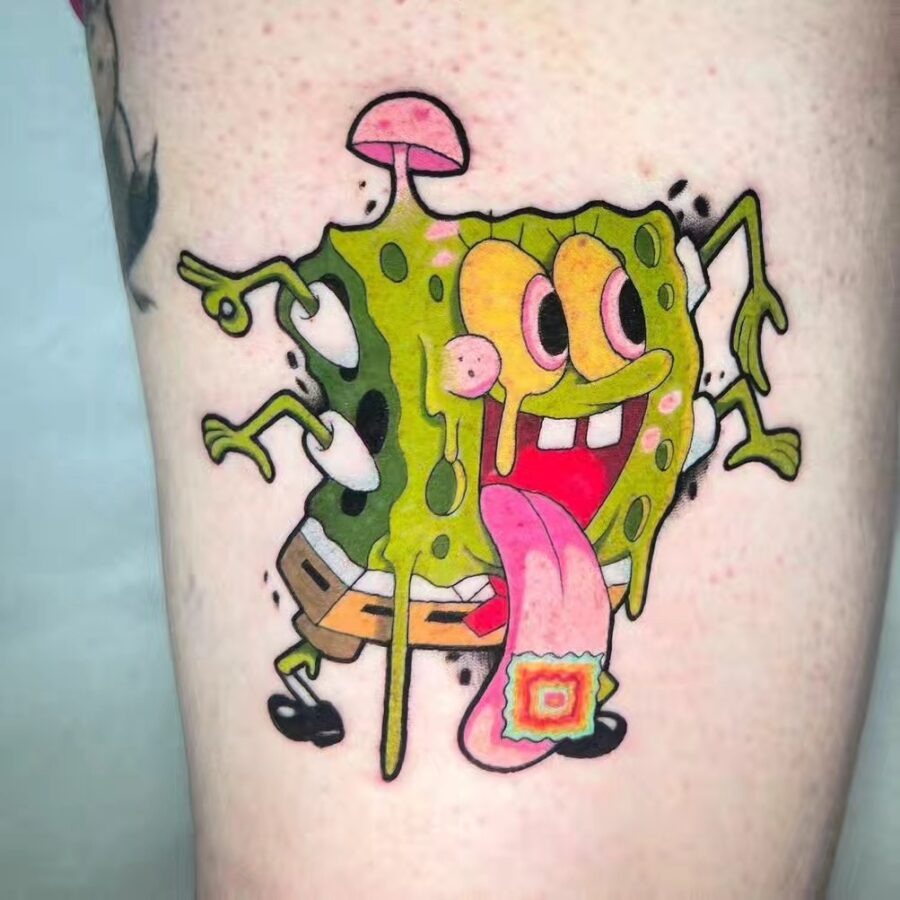 This whimsical tattoo showcases a colorful SpongeBob, brimming with personality.