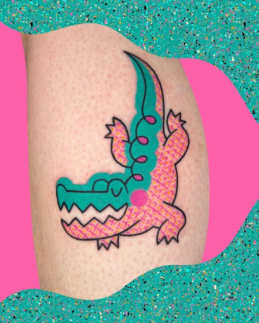 This crocodile tattoo showcases a fun and whimsical design, perfect for those who love playful ink.