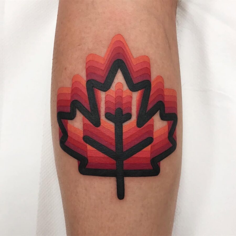 This stunning leaf tattoo features a dynamic gradient of warm colors, elegantly layered for depth.