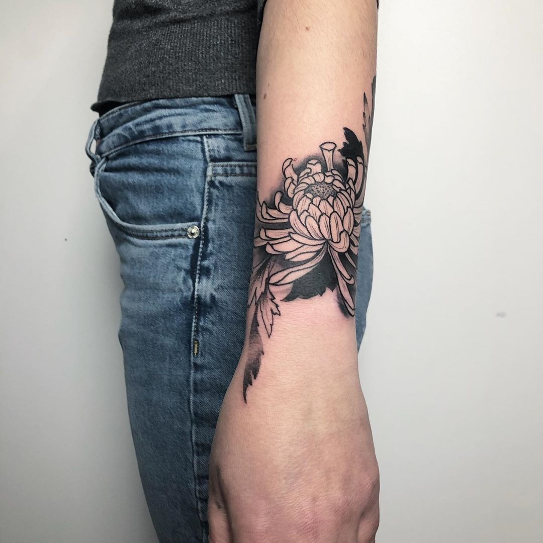 Blackwork Wrist Chrysanthemum, a tattoo design rendered in blackwork.