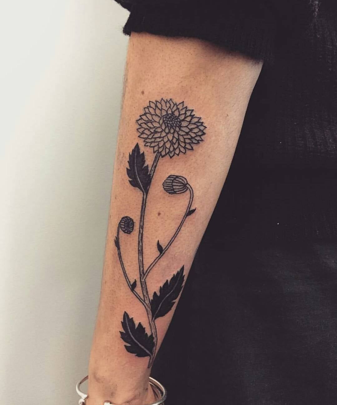 Bold Black Chrysanthemum Stem, a tattoo design rendered in blackwork.